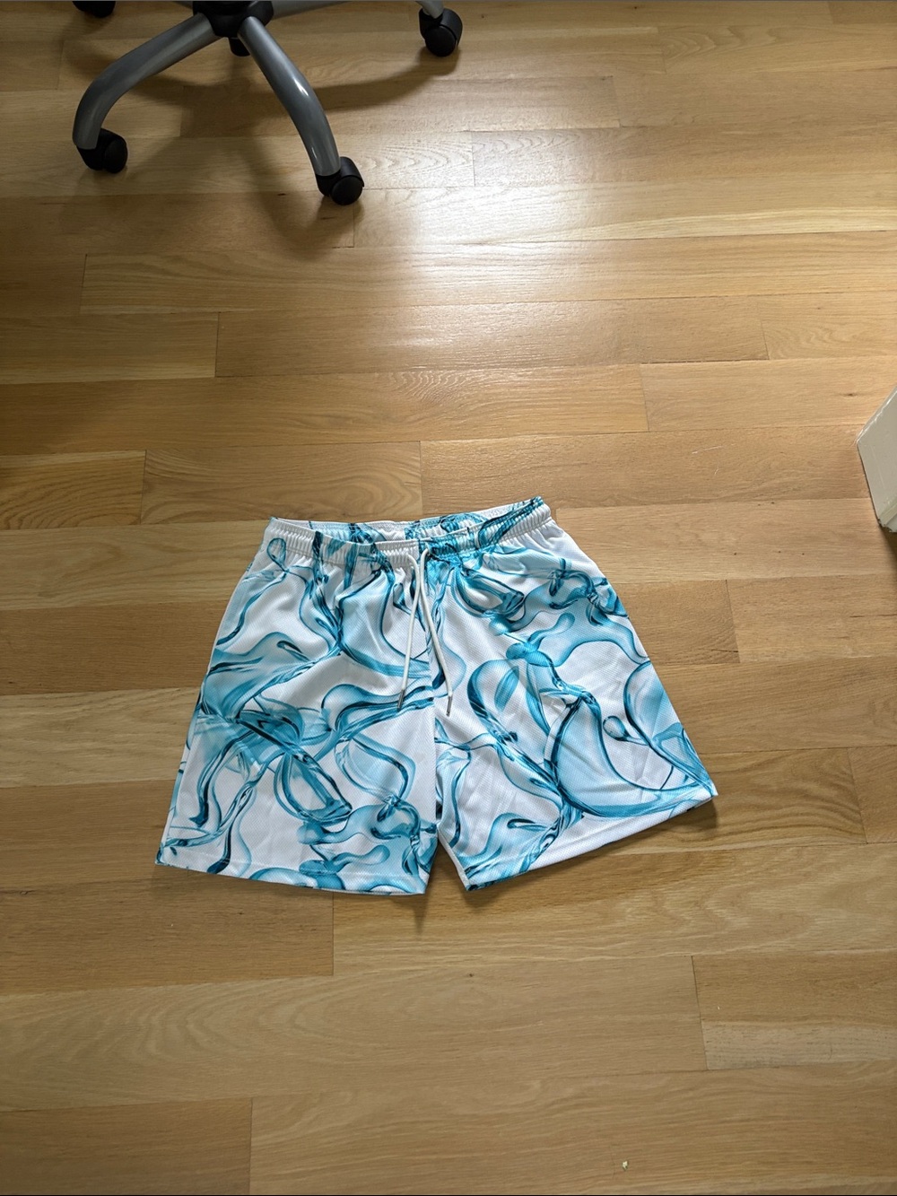 The Drip Shop Men's White Swim Shorts with Teal Wave Print